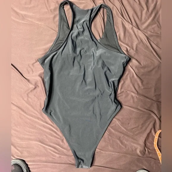 Black One-Piece Zip Up Swimsuit with Mesh Accents - Picture 11 of 13